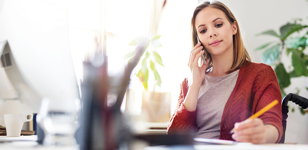 Image of woman taking a phone call