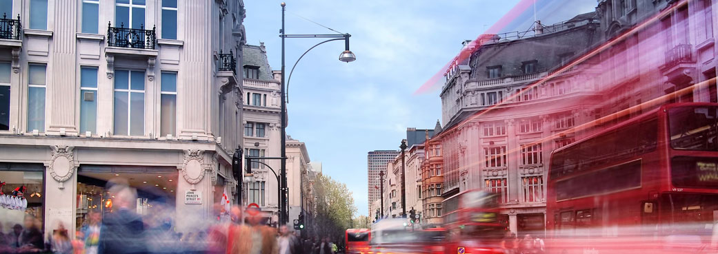 Image of london traffic through a busy shopping district