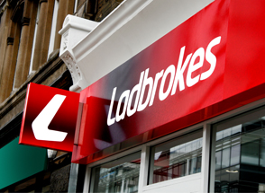 Ladbrokes - Taxes up, dividend down, Coral merger